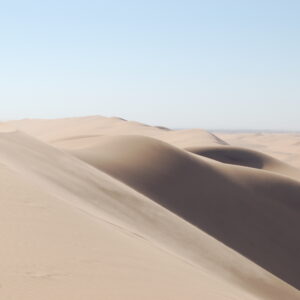 Swakopmund flying dress photoshoot dune backdrop (illustrative destination photo)