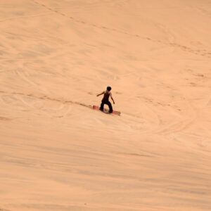 Sandboarding on the dunes near Swakopmund (illustrative destination photo)
