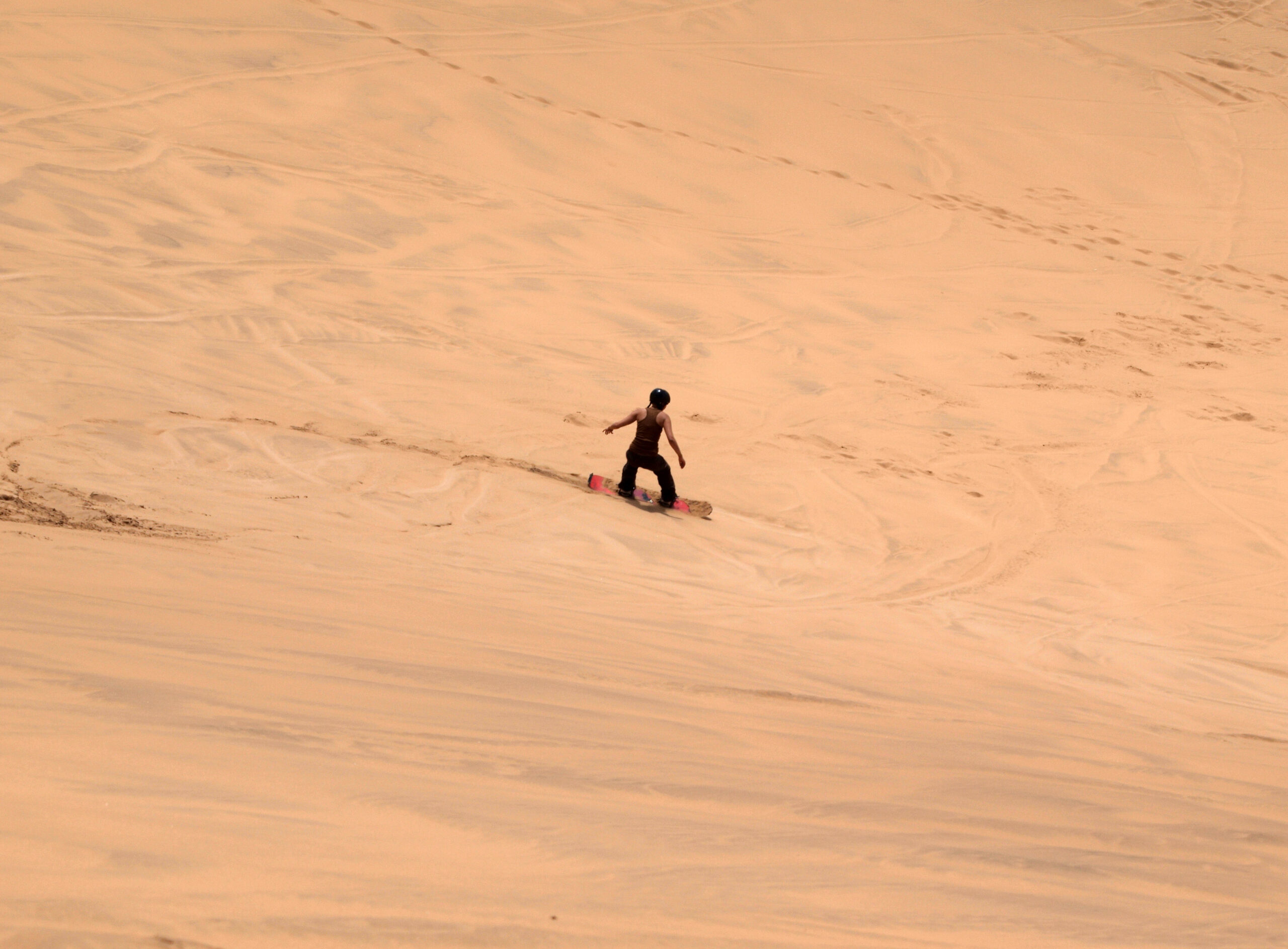 Sandboarding on the dunes near Swakopmund (illustrative destination photo)
