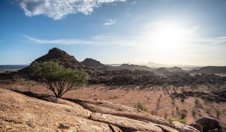 Sunset over rocky desert hills in Damaraland, Namibia