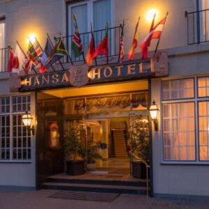 Hansa Hotel Swakopmund: hotel frontage with flags