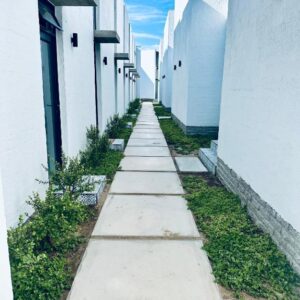 Casa RuMat Swakopmund: garden walkway between the units
