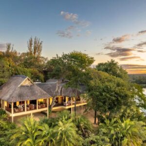 Divava Okavango Lodge: aerial view of the lodge on the riverbank