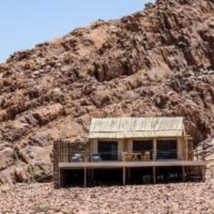 Elegant Desert Camp Sesriem: camp building against the hillside