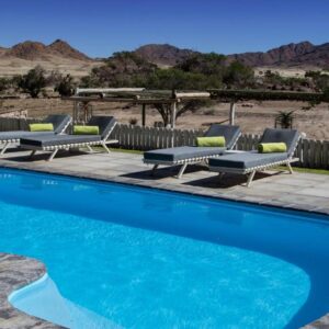 Elegant Desert Lodge Sesriem: pool terrace with mountain backdrop