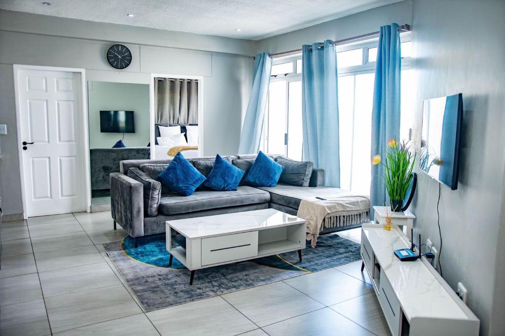Elegant Home, Swakopmund: sala de estar