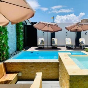 Essence Lifestyle Premium, Windhoek: pool with umbrellas and loungers