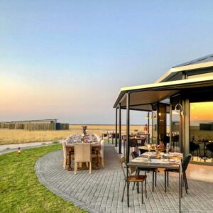 Etosha King Nehale: outdoor terrace seating on the lawn
