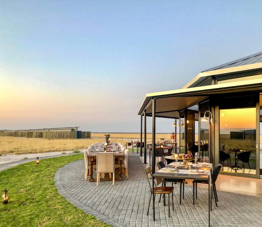 Etosha King Nehale: outdoor terrace seating on the lawn