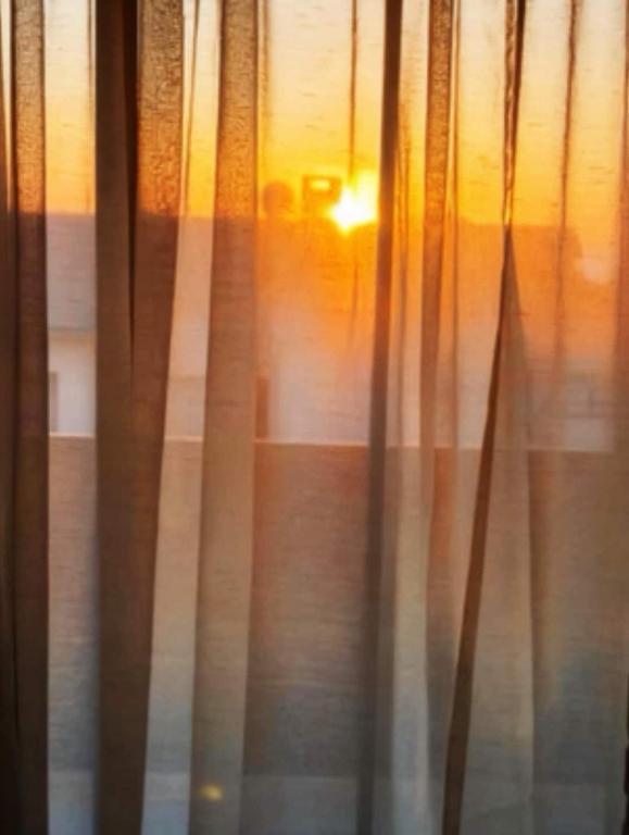 Serene Stay Self Catering, Swakopmund: sunset view from the window