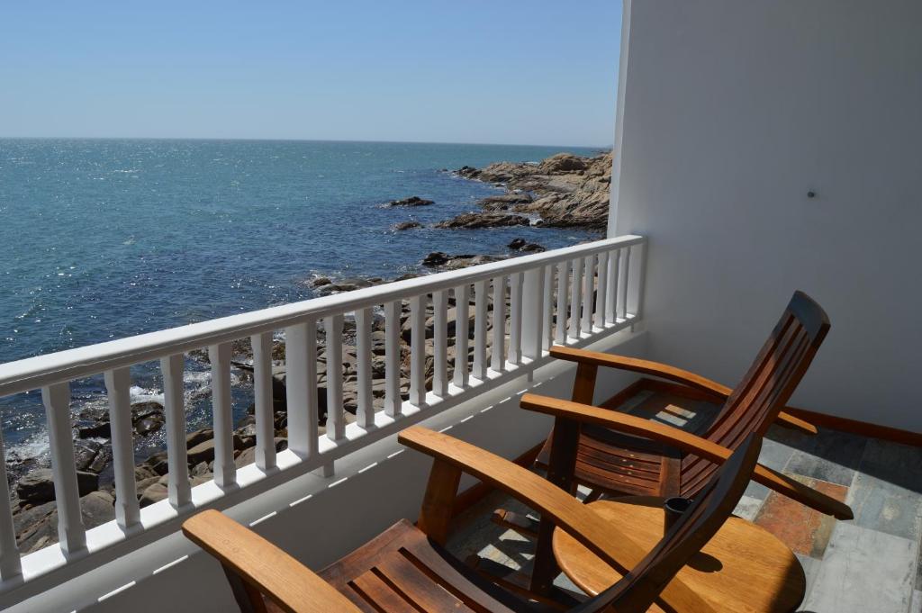 The Cormorant House Luderitz: balcony seating overlooking the ocean