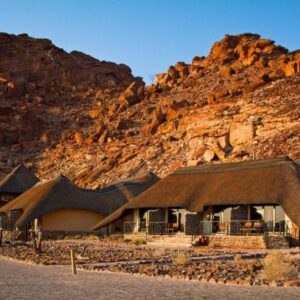 Twyfelfontein Country Lodge: lodge set against the rock face