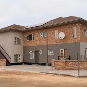 Vineta Holiday Home Swakopmund: brick building exterior with stairway